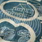 Close-up view of rare antique indigo tsutsugaki-dyed cotton futon cover with tea ceremony utensils motif. 