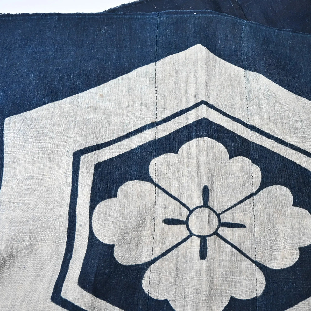Detailed view of antique Japanese large indigo tsutsugaki dyed cotton futon cover from 19th Century.