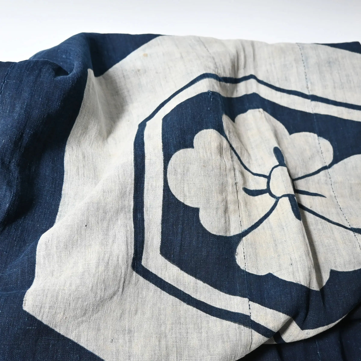 Detailed view of antique Japanese large indigo tsutsugaki dyed cotton futon cover from 19th Century.
