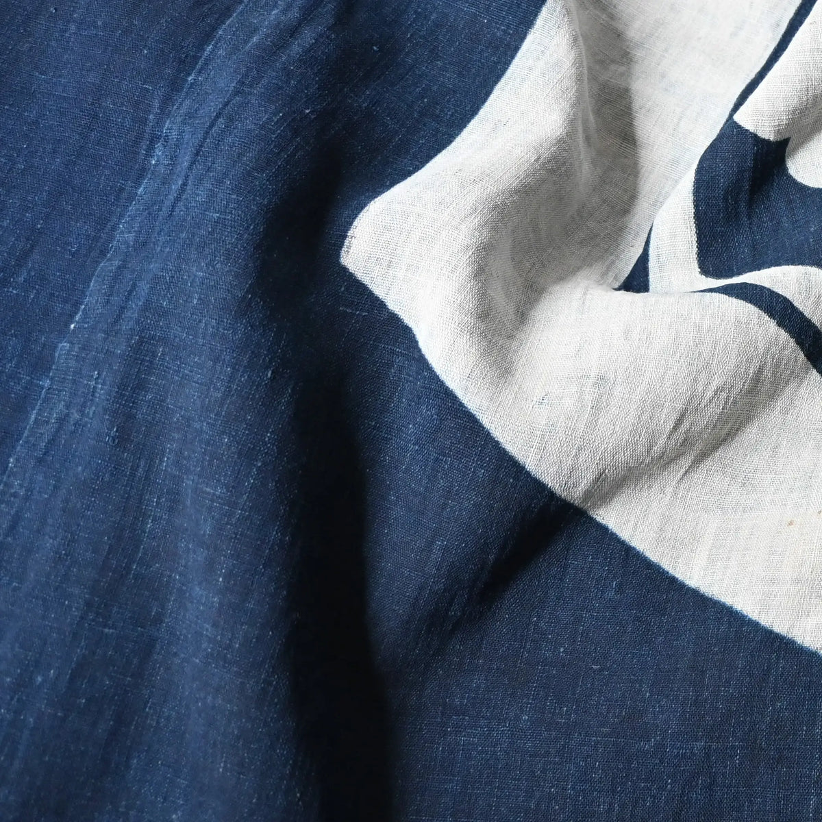 Detailed view of antique Japanese large indigo tsutsugaki dyed cotton futon cover from 19th Century.