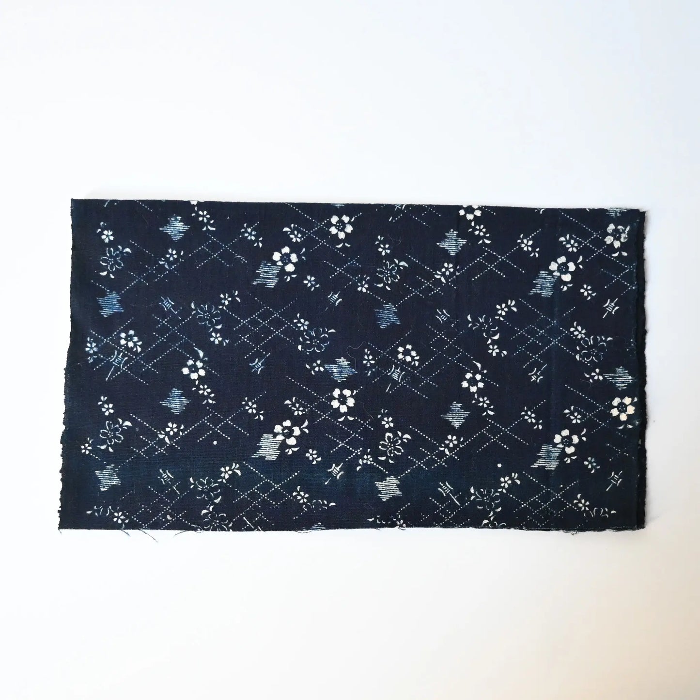 Antique Japanese indigo Katazome cotton with cherry blossom motif from the early 20th century.