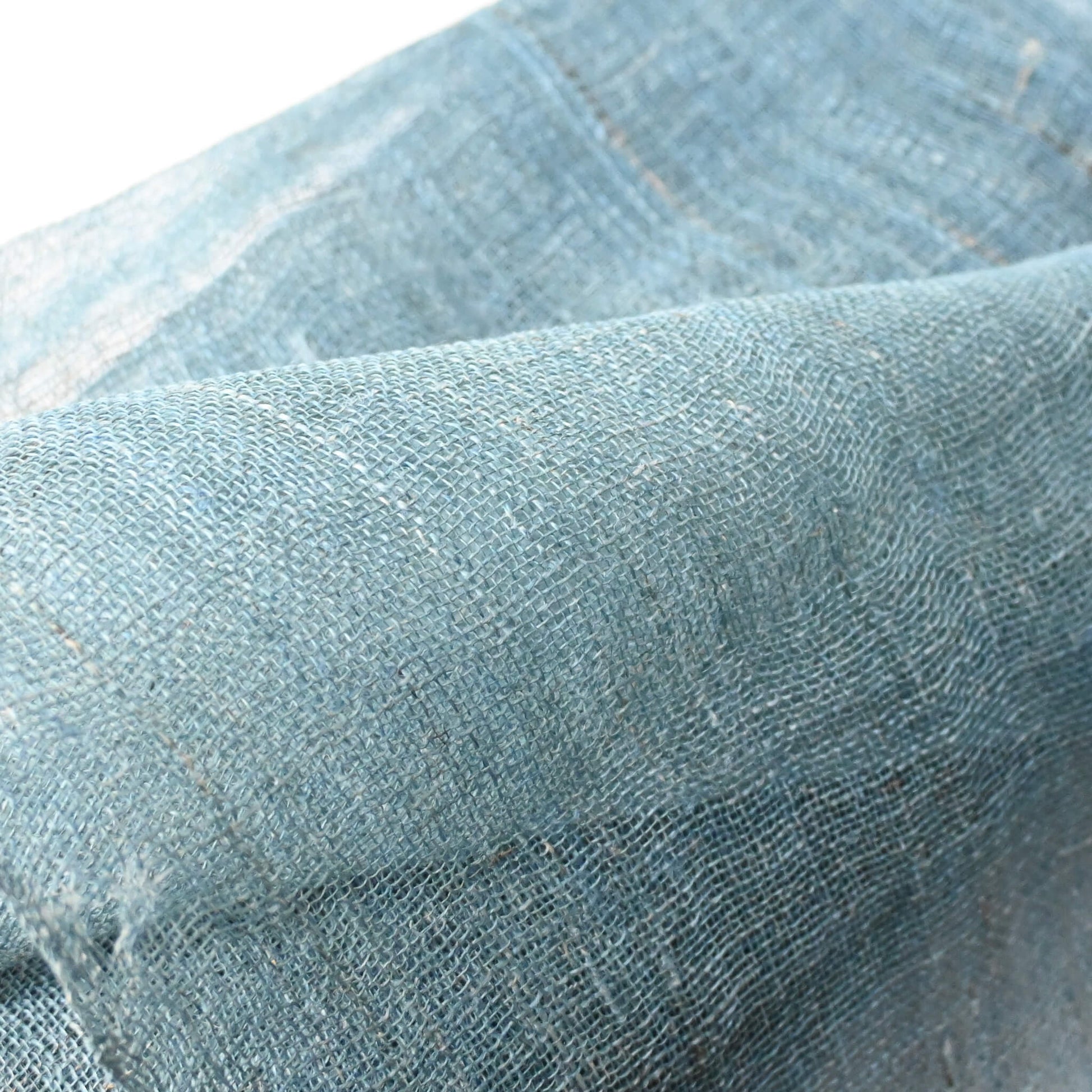 Detailed view of open weave antique Japanese indigo dyed hemp.