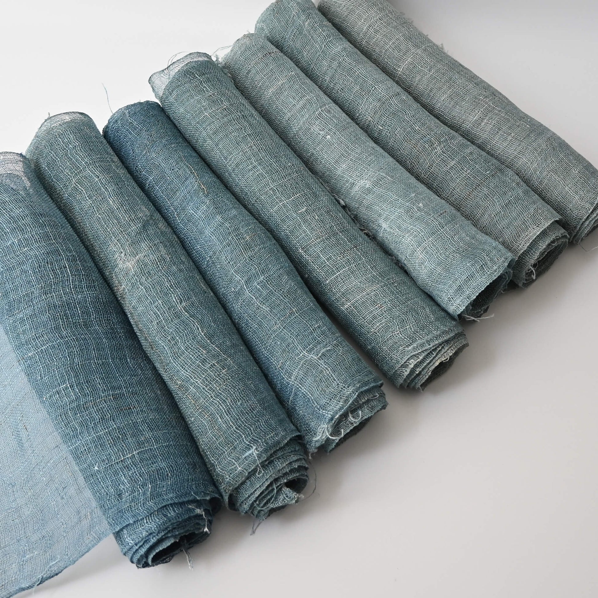Antique Japanese indigo dyed hemp Kaya panels, light to dark colour.
