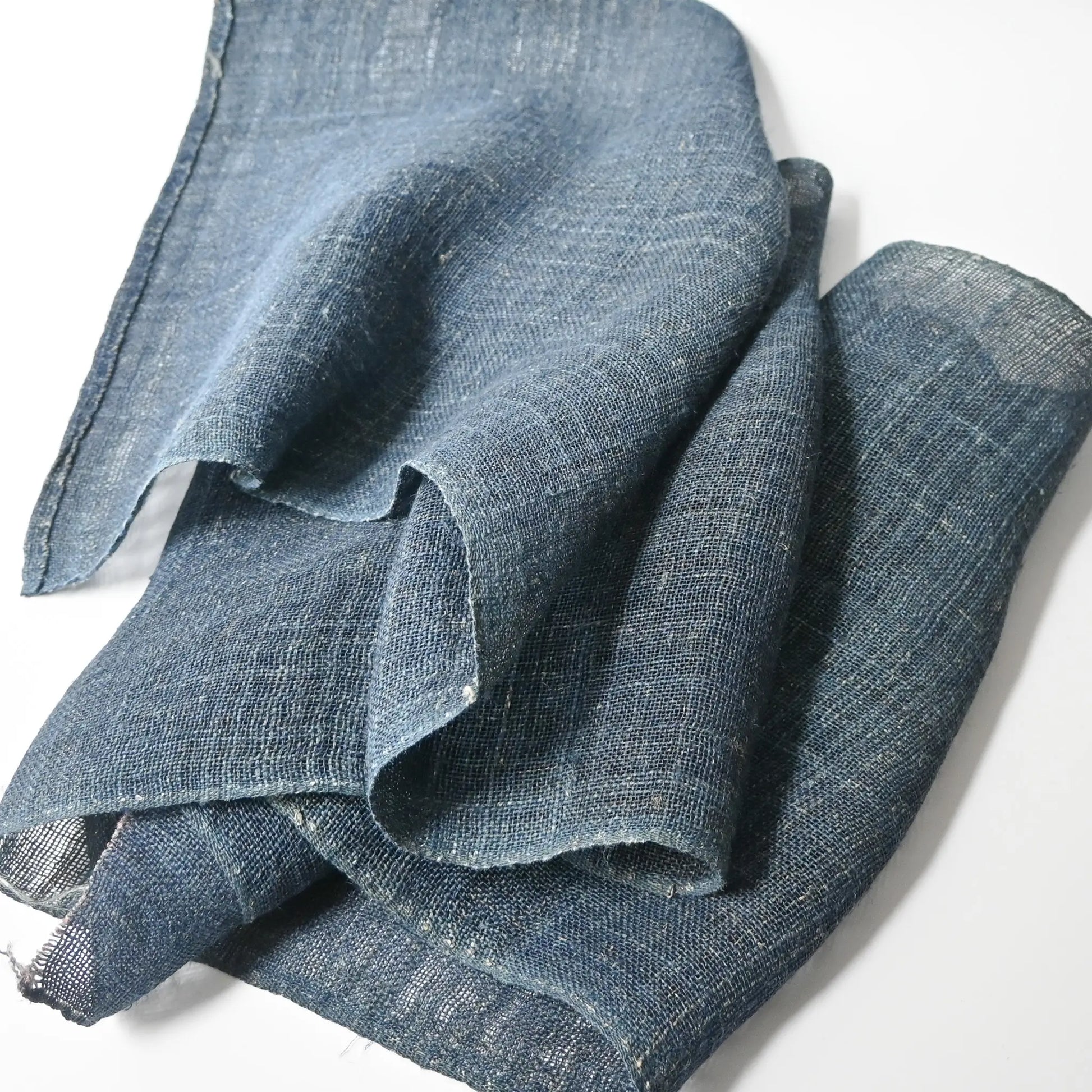 Antique Japanese indigo dyed open-weave hemp Kaya panel from the early 20th century drapes beautifully.