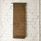 Antique Japanese silk brocade Maru Obi, hanging as an art piece.