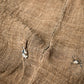 Close-up view of antique Japanese natural brown six-panel hemp mosquito net Kaya with beautiful mends.