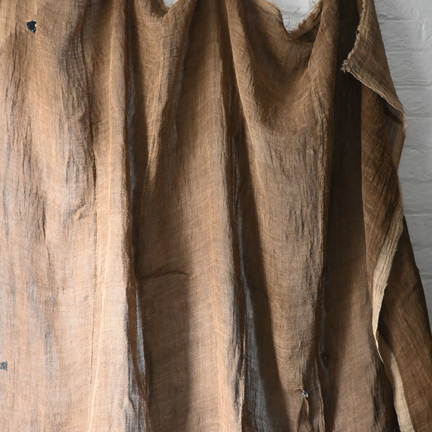 Hanging view of antique Japanese natural brown six-panel hemp mosquito net Kaya with beautiful mends.