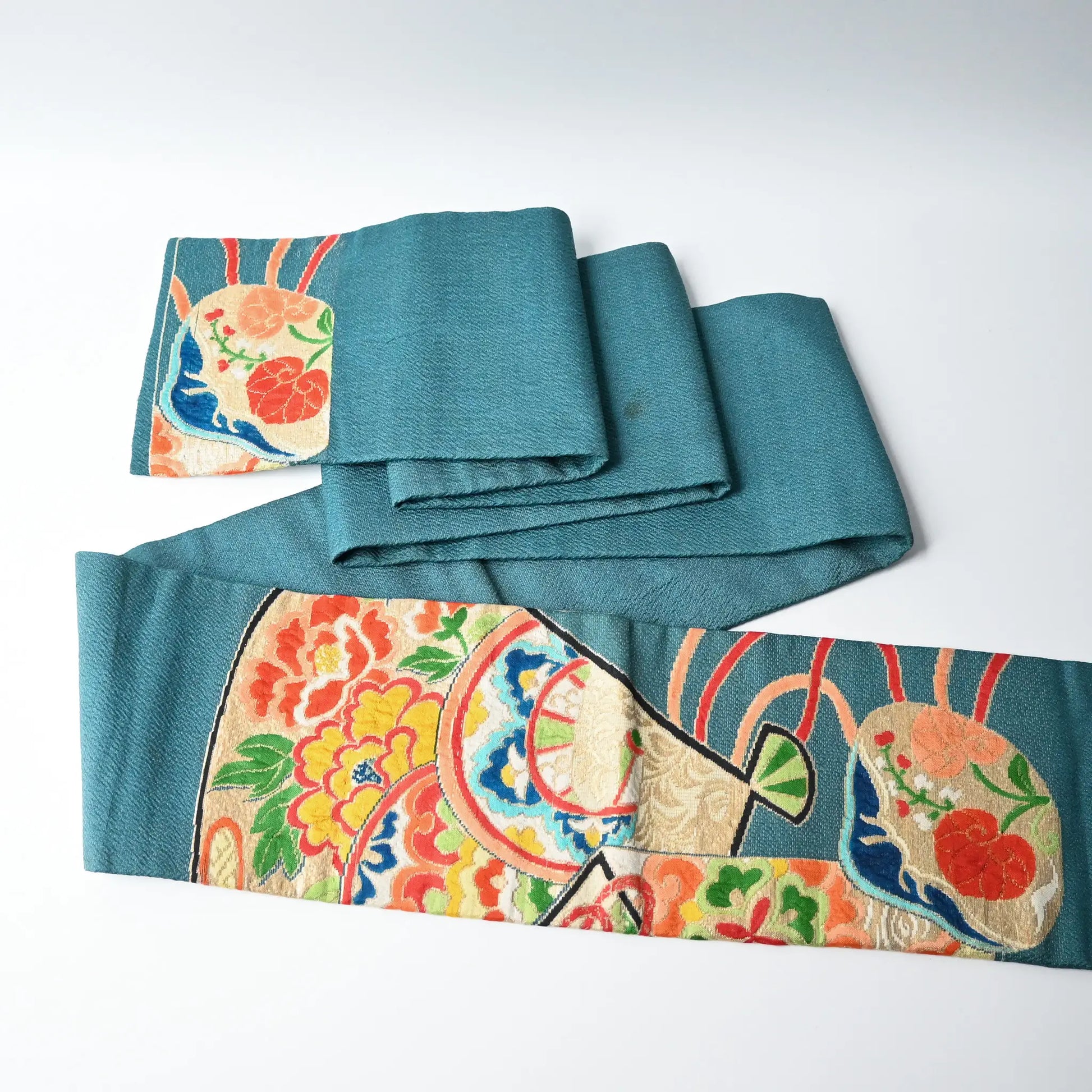 The waste part of antique Japanese women's teal blue Nagoya obi with gorgeous fan and Kaioke motif from 1930-40s.