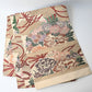 Antique silk Maru obi with floral bouquet motif from the early 20th century.