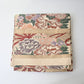Antique silk Maru obi with floral bouquet motif from the early 20th century.