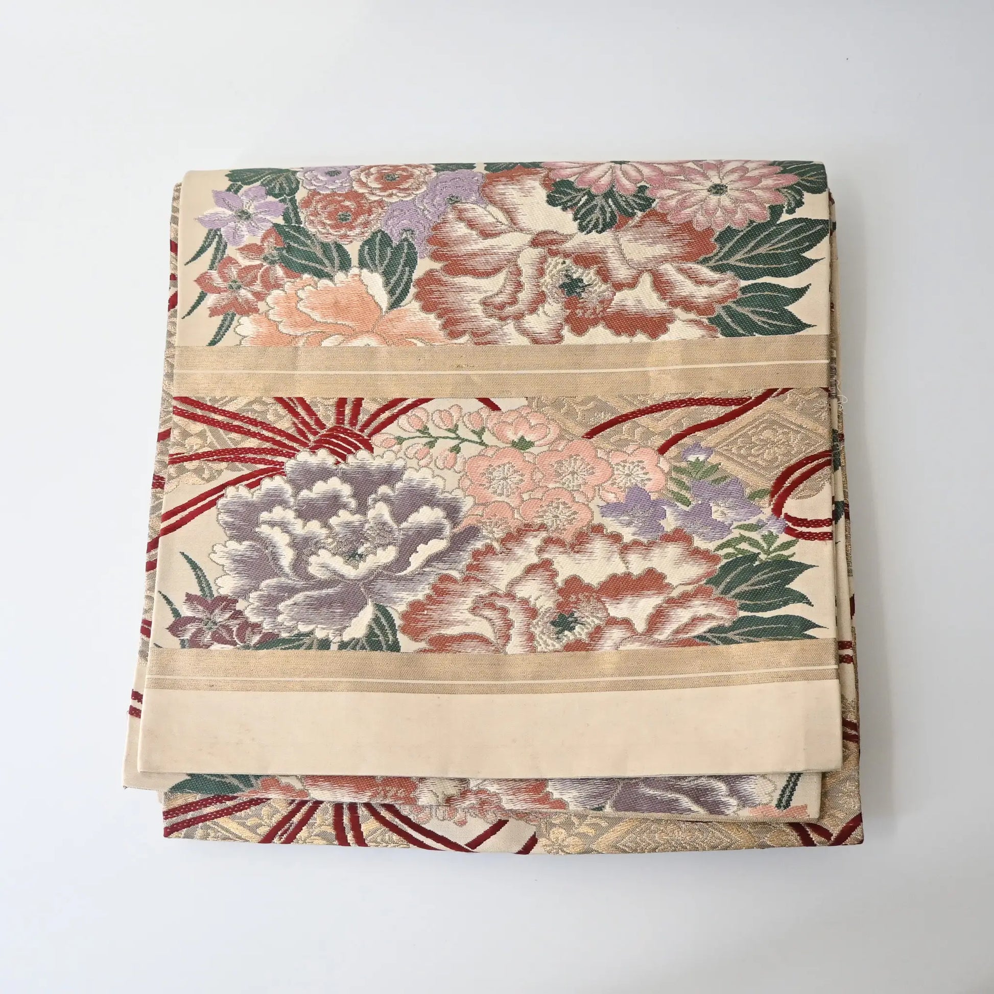 Antique silk Maru obi with floral bouquet motif from the early 20th century.