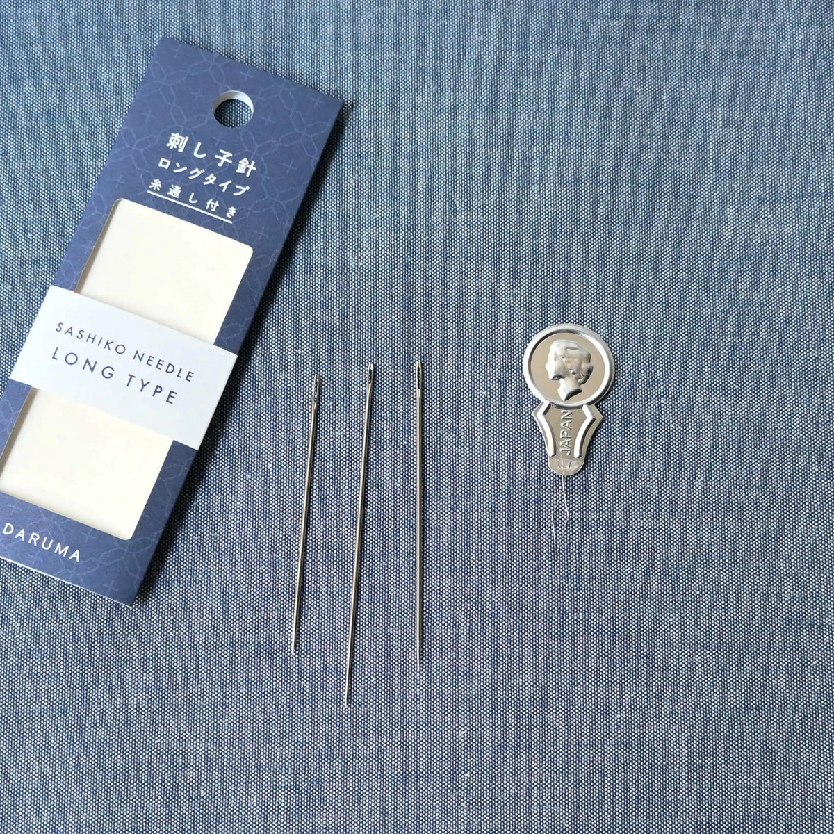 Set of three Japan-made sashiko needles from Daruma, with different lengths and thicknesses, comes with a needle threader.