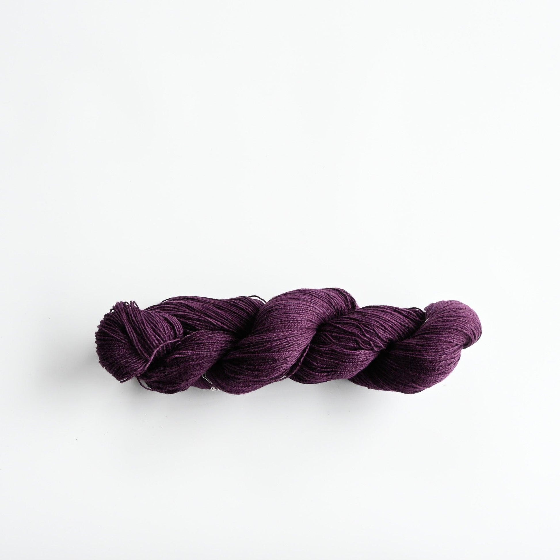 Authentic Japanese sashiko threads hank from Hida, Gifu, in aubergine.