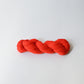 Authentic Japanese sashiko threads hank from Hida, Gifu, in bright orange.