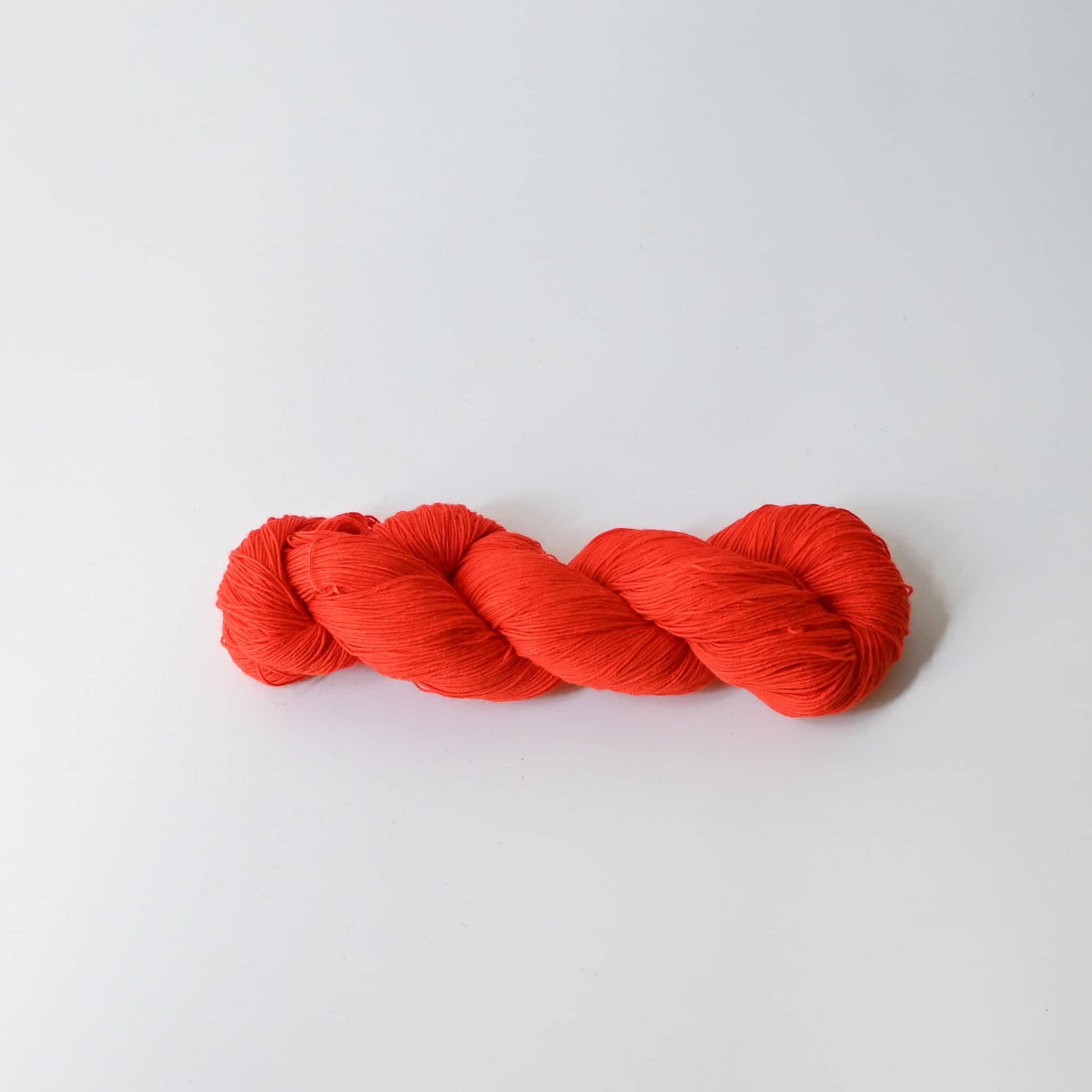 Authentic Japanese sashiko threads hank from Hida, Gifu, in bright orange.