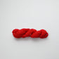 Authentic Japanese sashiko threads hank from Hida, Gifu, in bright red.