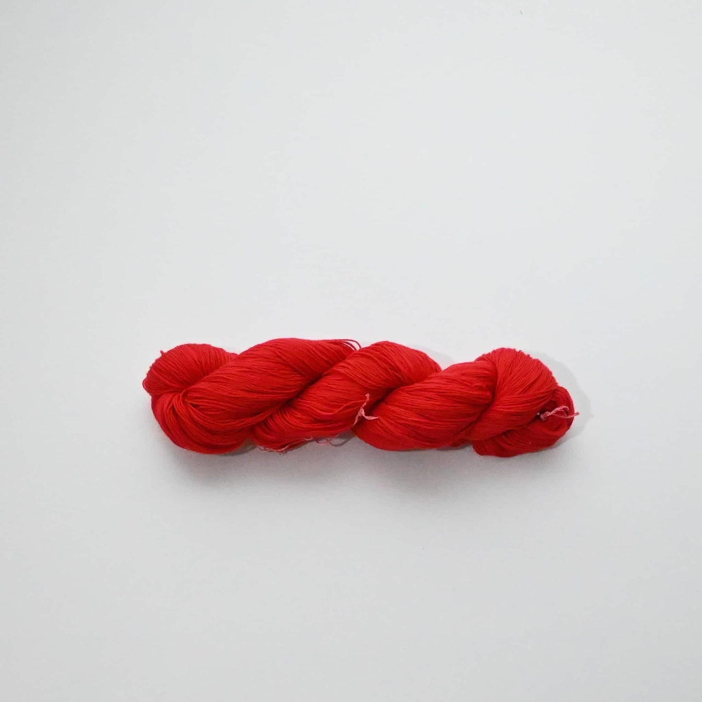 Authentic Japanese sashiko threads hank from Hida, Gifu, in bright red.