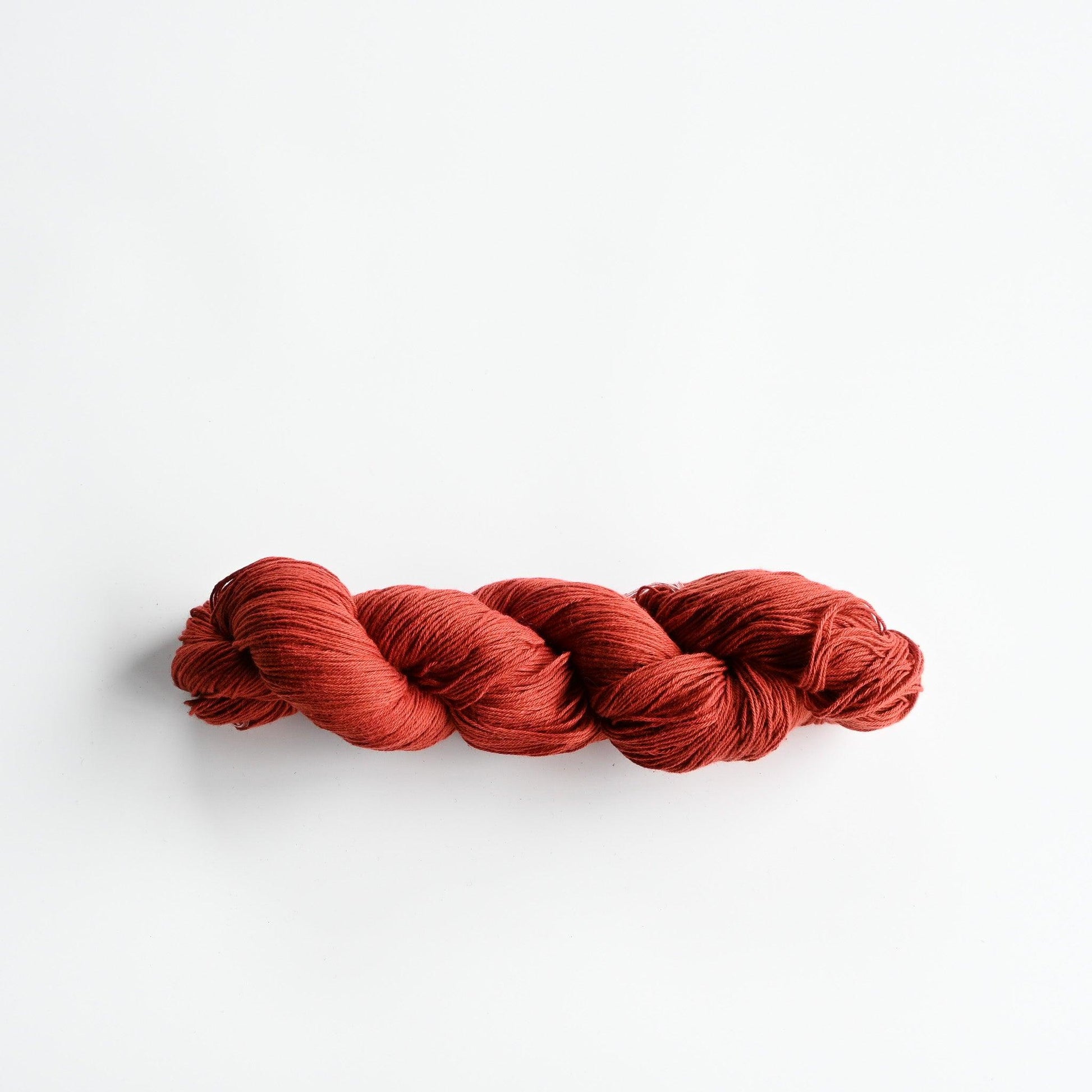 Authentic Japanese sashiko threads hank from Hida, Gifu, in terracotta.