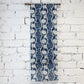 Hanging new of antique indigo katazome dyed hemp futon cover panel from the early 20th century, Aoi leaves with Yoroke stripes.