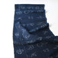 Full view of rare vintage indigo kasuri cotton with pictorial motifs,  including gourds, plum blossoms, and umbrellas.