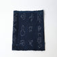 Rare vintage indigo kasuri cotton with pictorial motifs,  including gourds, plum blossoms, and umbrellas.