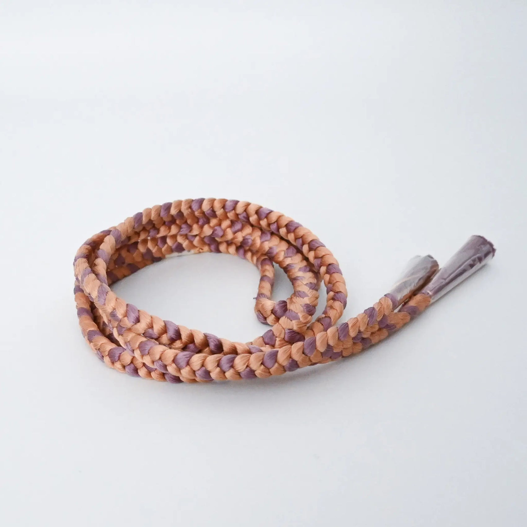 Recycled silk braided obijime cord in soft pink and purple.