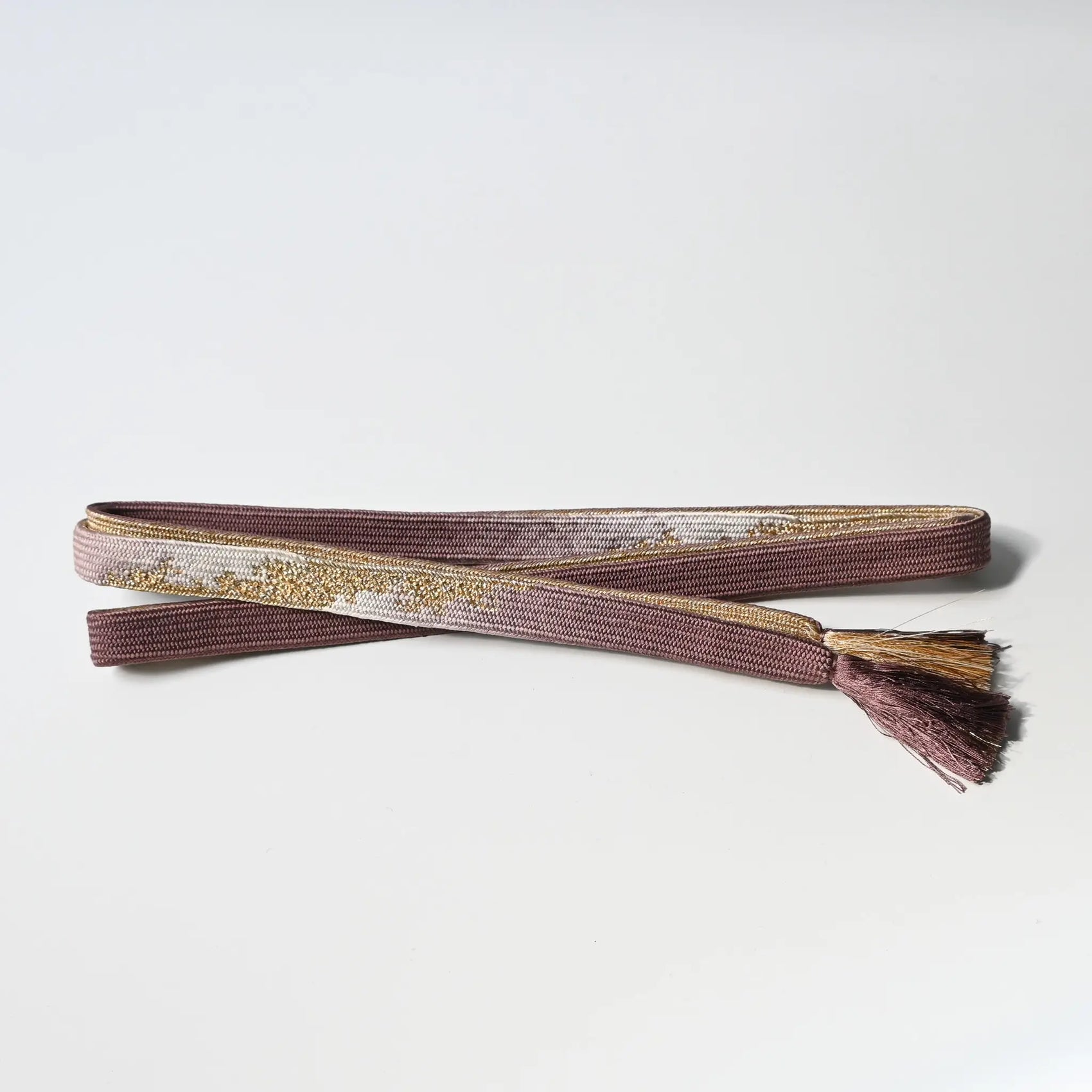 Vintage/recycled women's kimono dress accessories, Obijime cord in dusty mauve and gold.