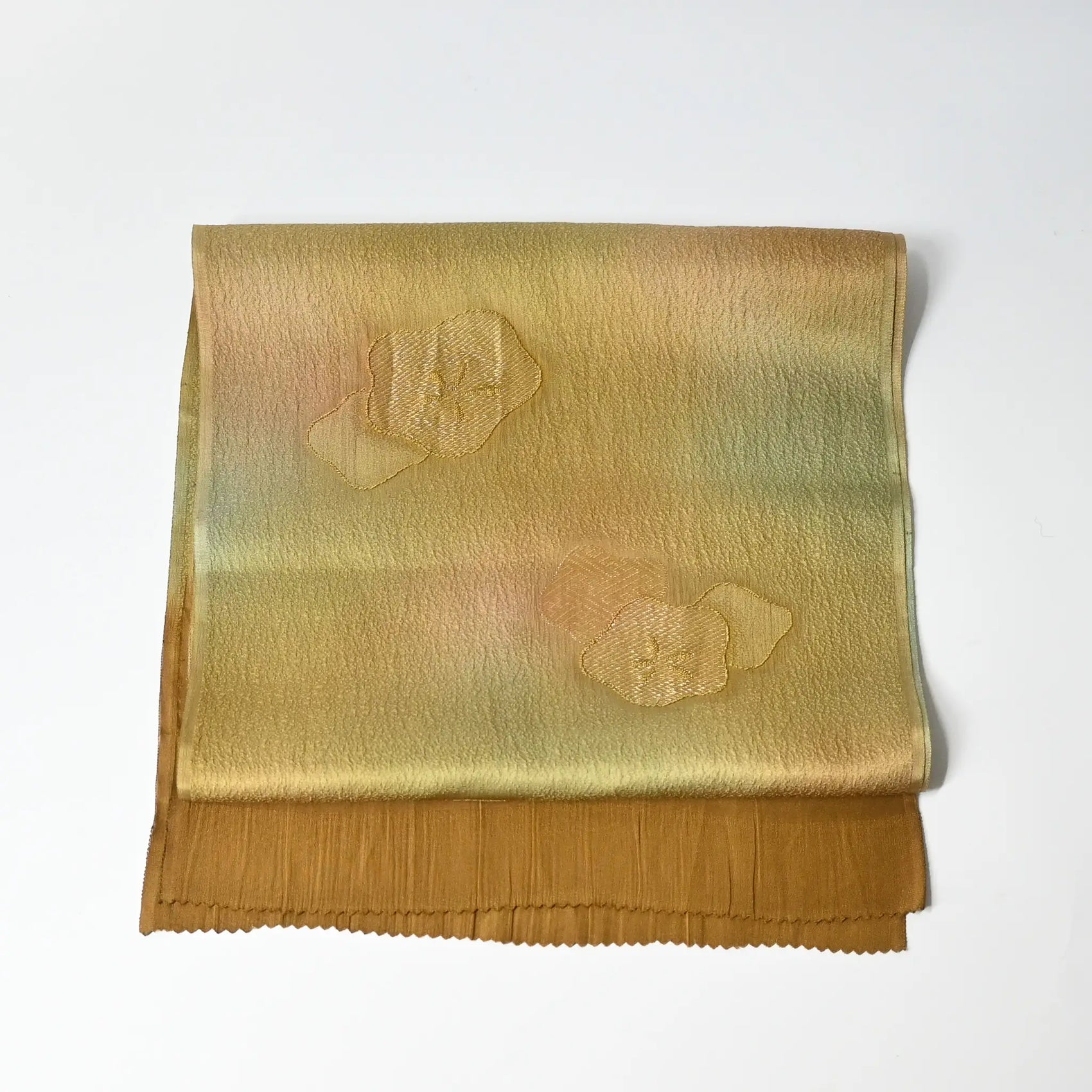Recycled green silk obiage with gold plum blossom.