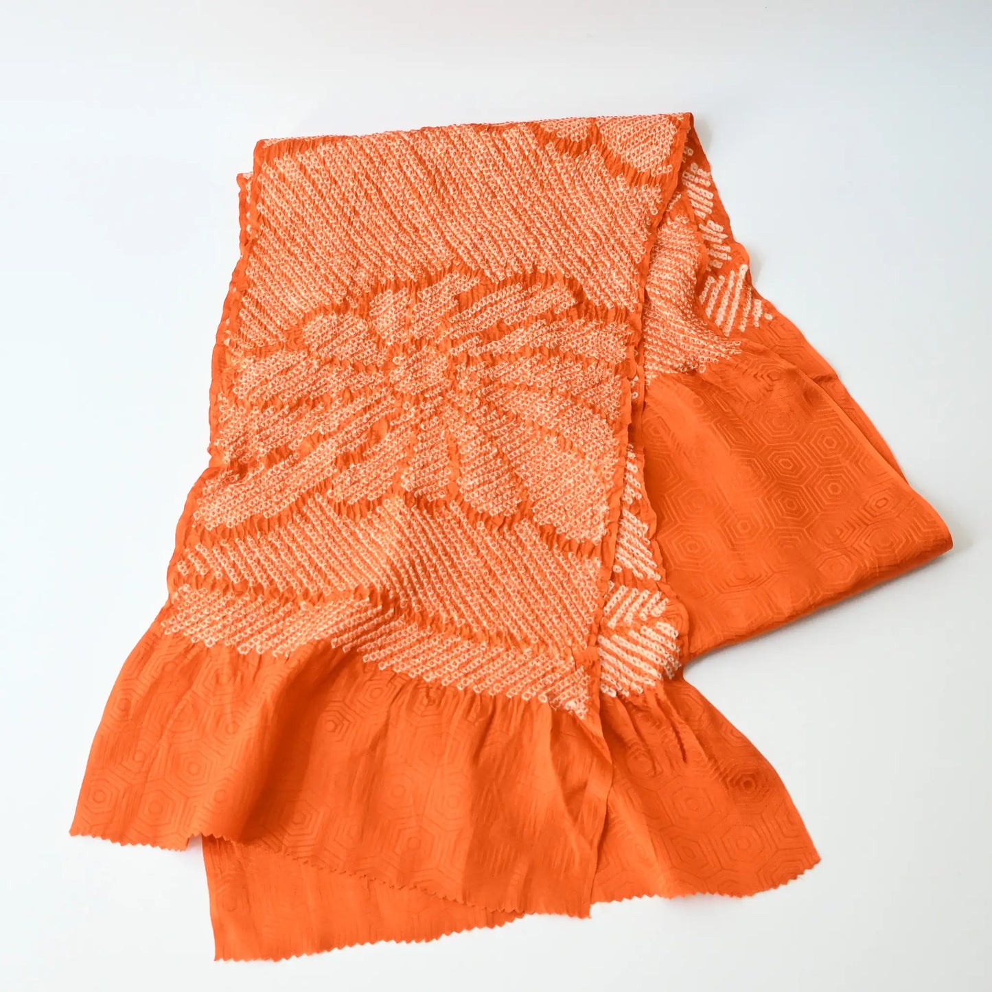 Recycled persimmon orange silk shibori oblige with chrysanthemum motif.