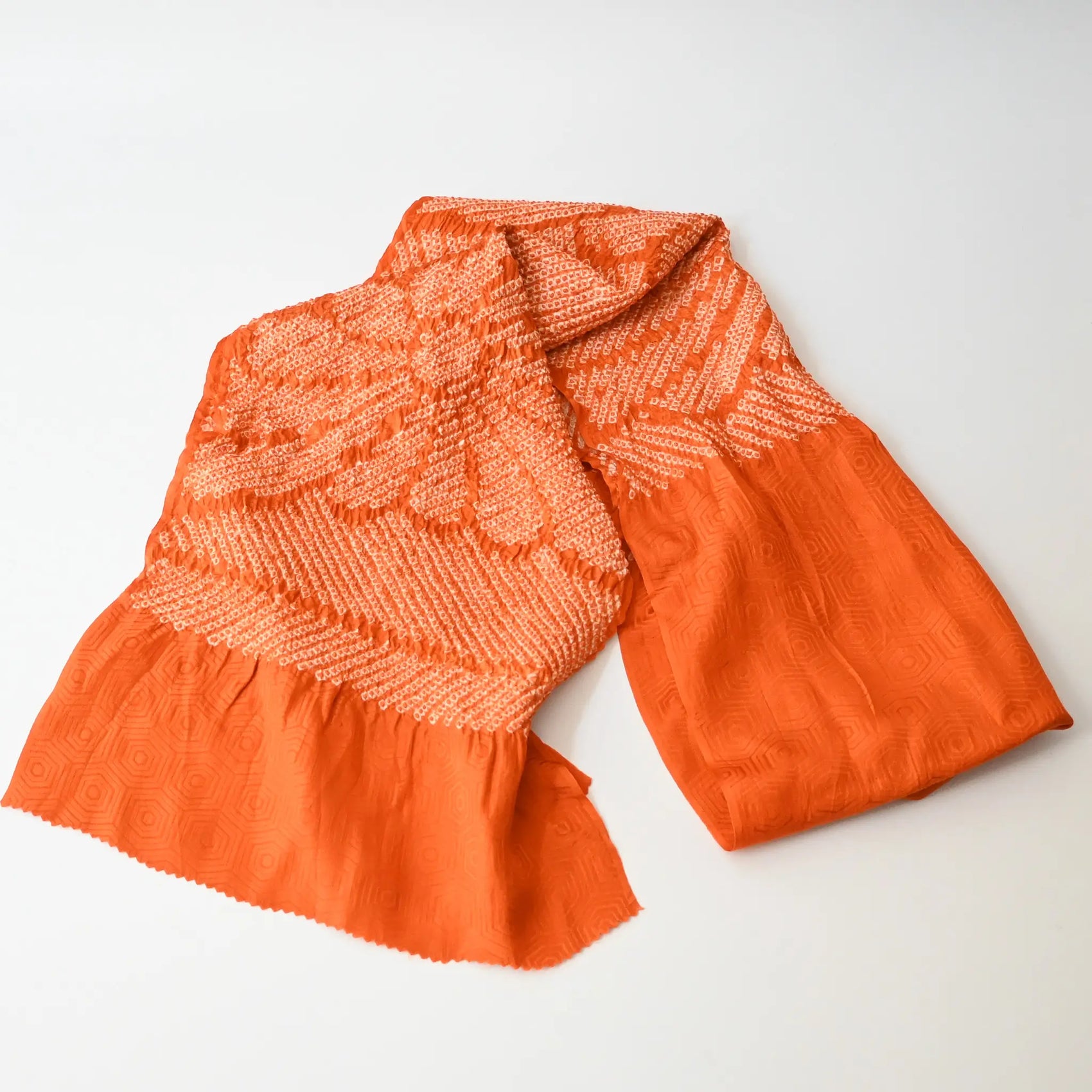 Recycled persimmon orange silk shibori oblige with chrysanthemum motif.
