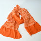 Recycled persimmon orange silk shibori oblige with chrysanthemum motif.