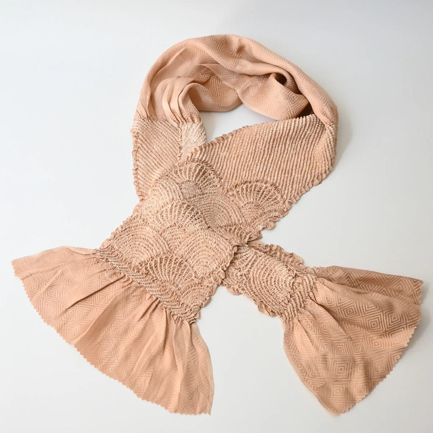 Recycled silk shibori obiage in soft pink-beige, can be worn as a scarf.
