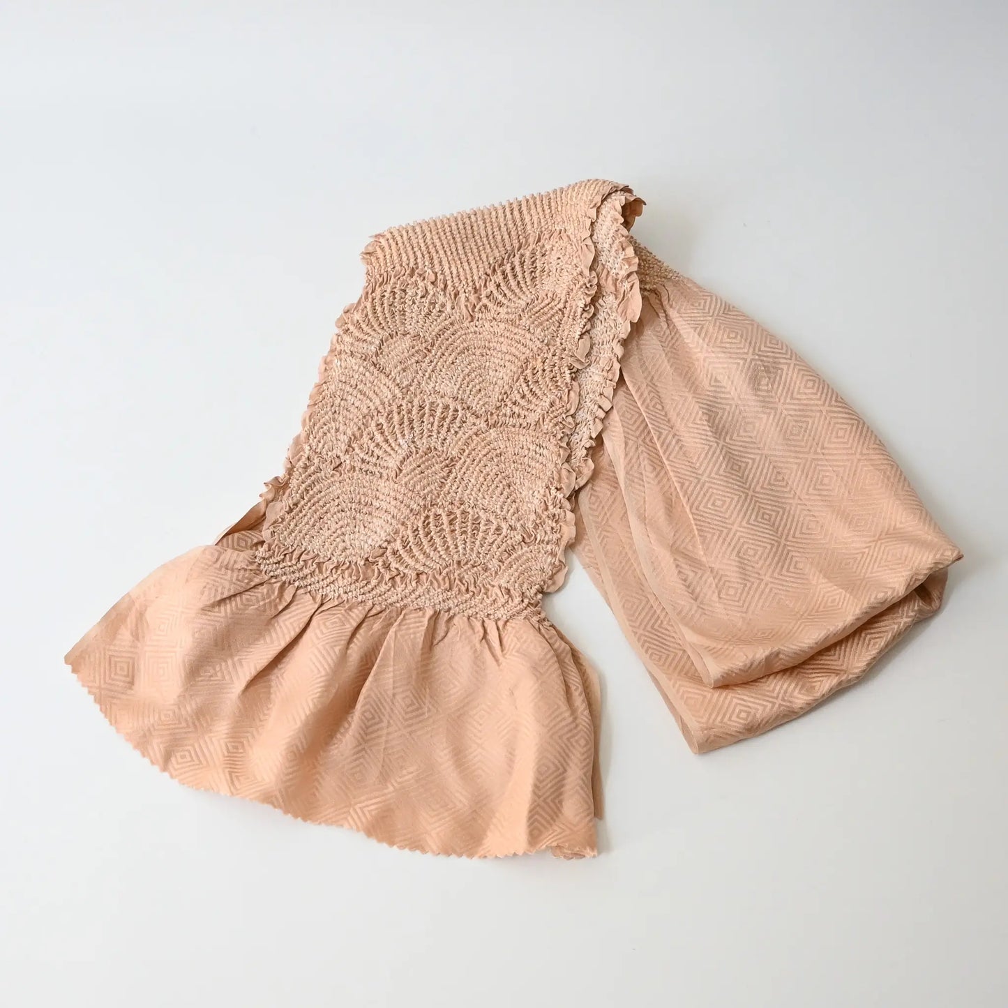 Recycled silk shibori obiage in soft pink-beige.