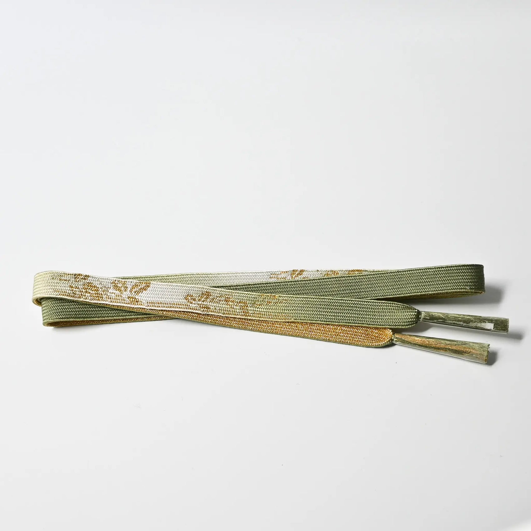 Vintage/recycled women's kimono dress accessories, Obijime cord in sage green and gold.