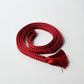 A recycled vintage obijime braided cord in a vibrant red.