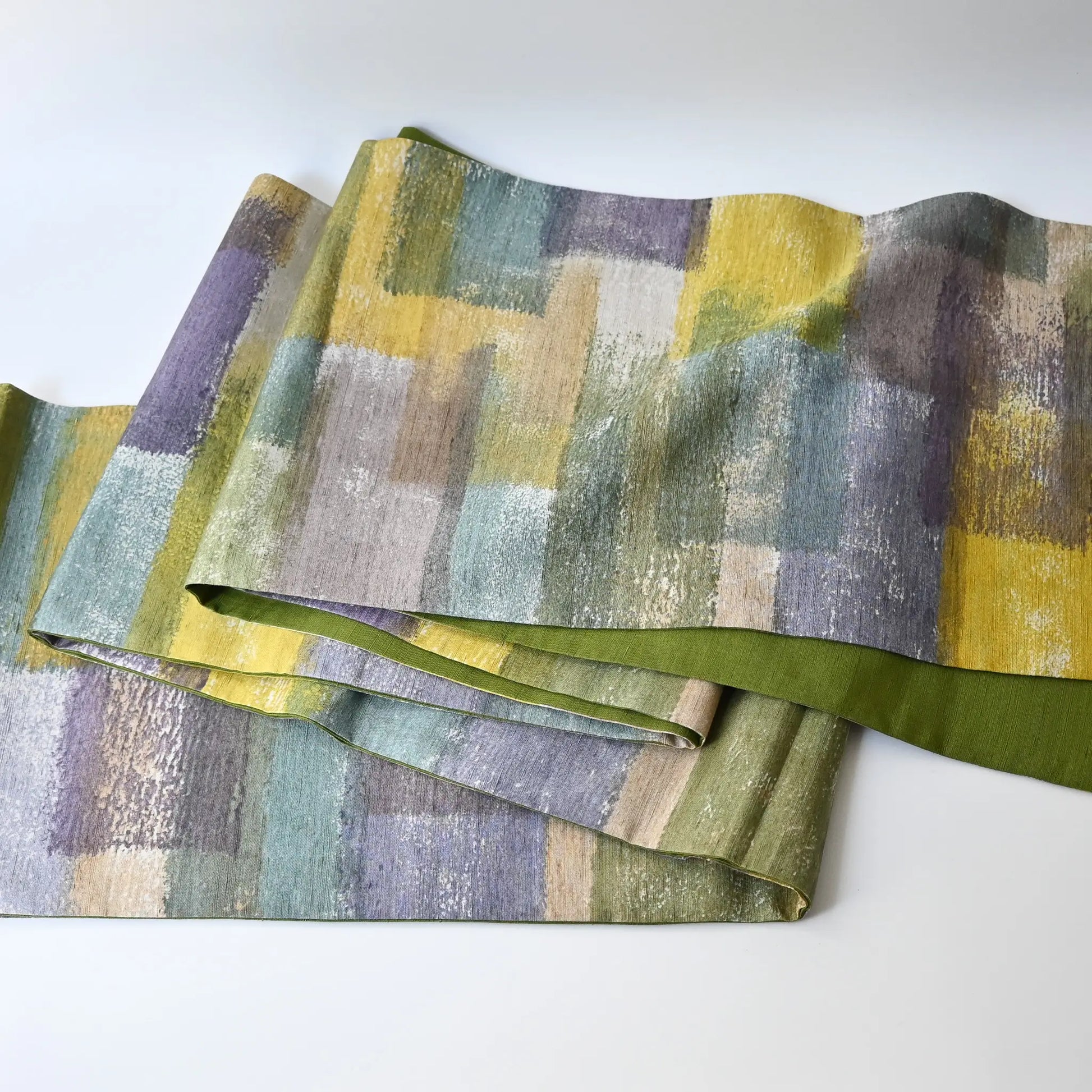 Full view of recycled women's tsumugi silk obi with dyed abstract painterly motif.