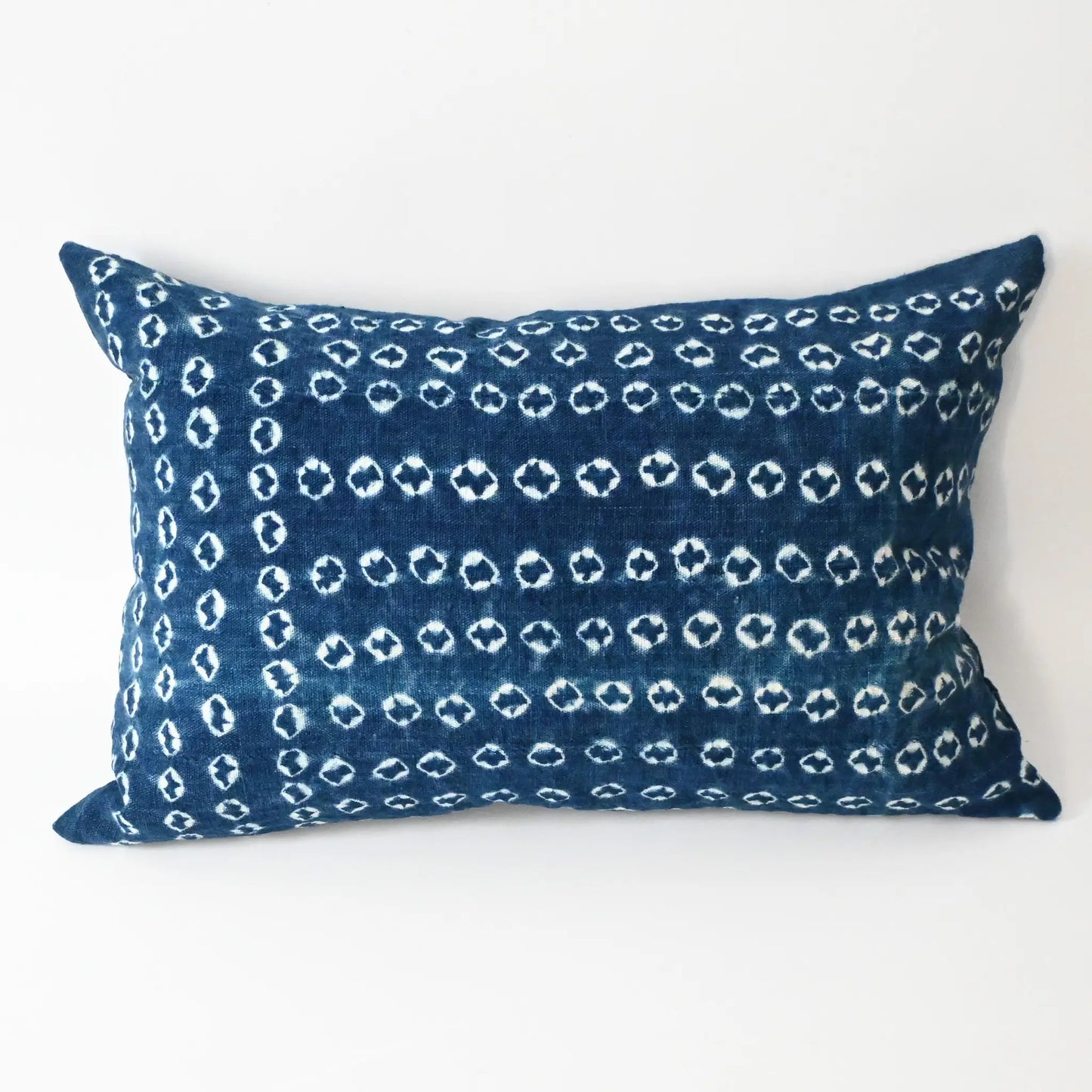 Handmade shibori indigo African mudcloth cushion with duck feather insert.