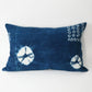 Handmade shibori indigo African mudcloth cushion with duck feather insert.