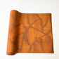 Vintage amber brown tsumugi silk kimono fabric with abstract pattern, sold by the metre.