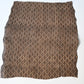 Full view of vintage collectable bashofu banana fibre textile fragment in rich brown with geometric pattern.