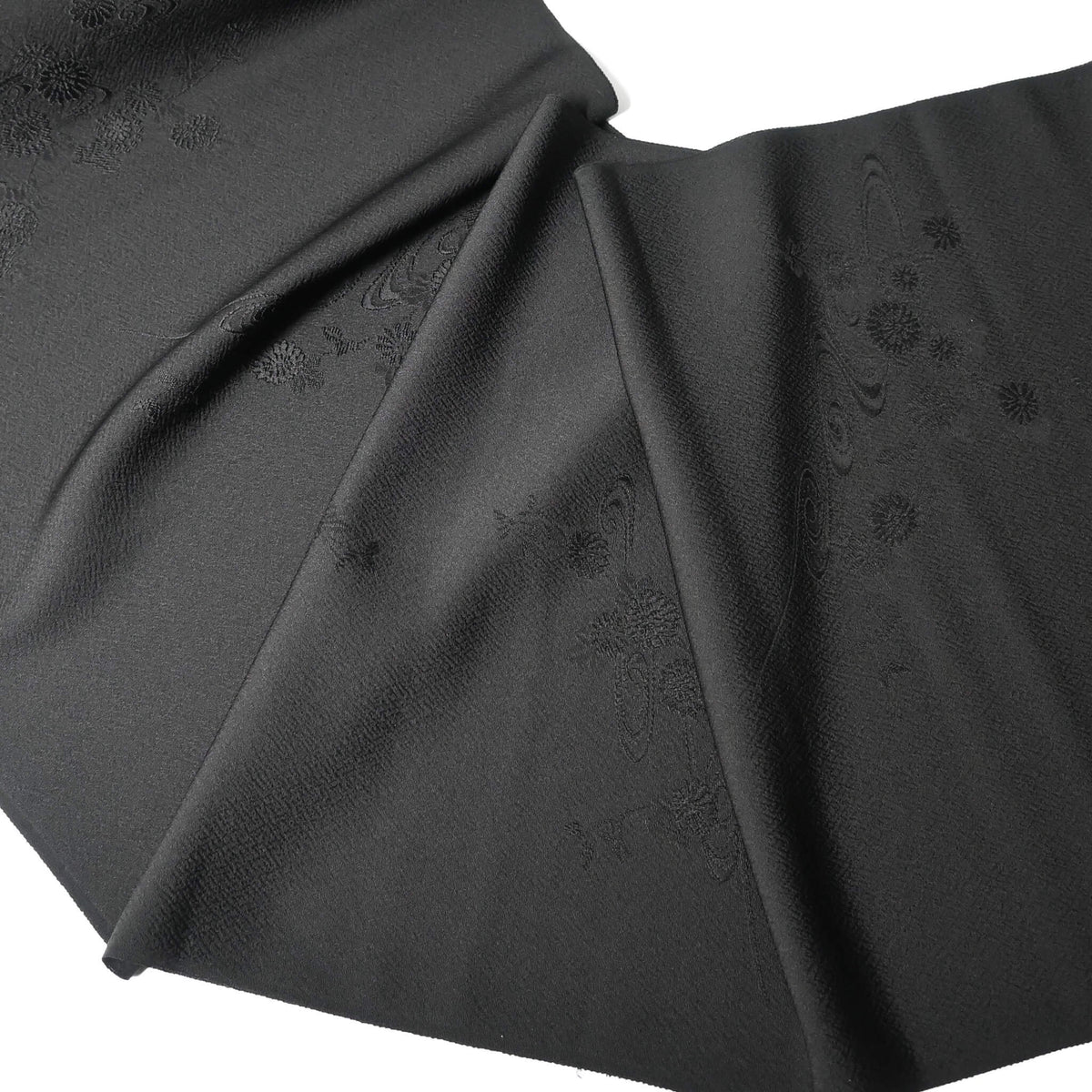 Vintage black silk jacquard kimono fabric with running water and chrysanthemum motifs, drape well.
