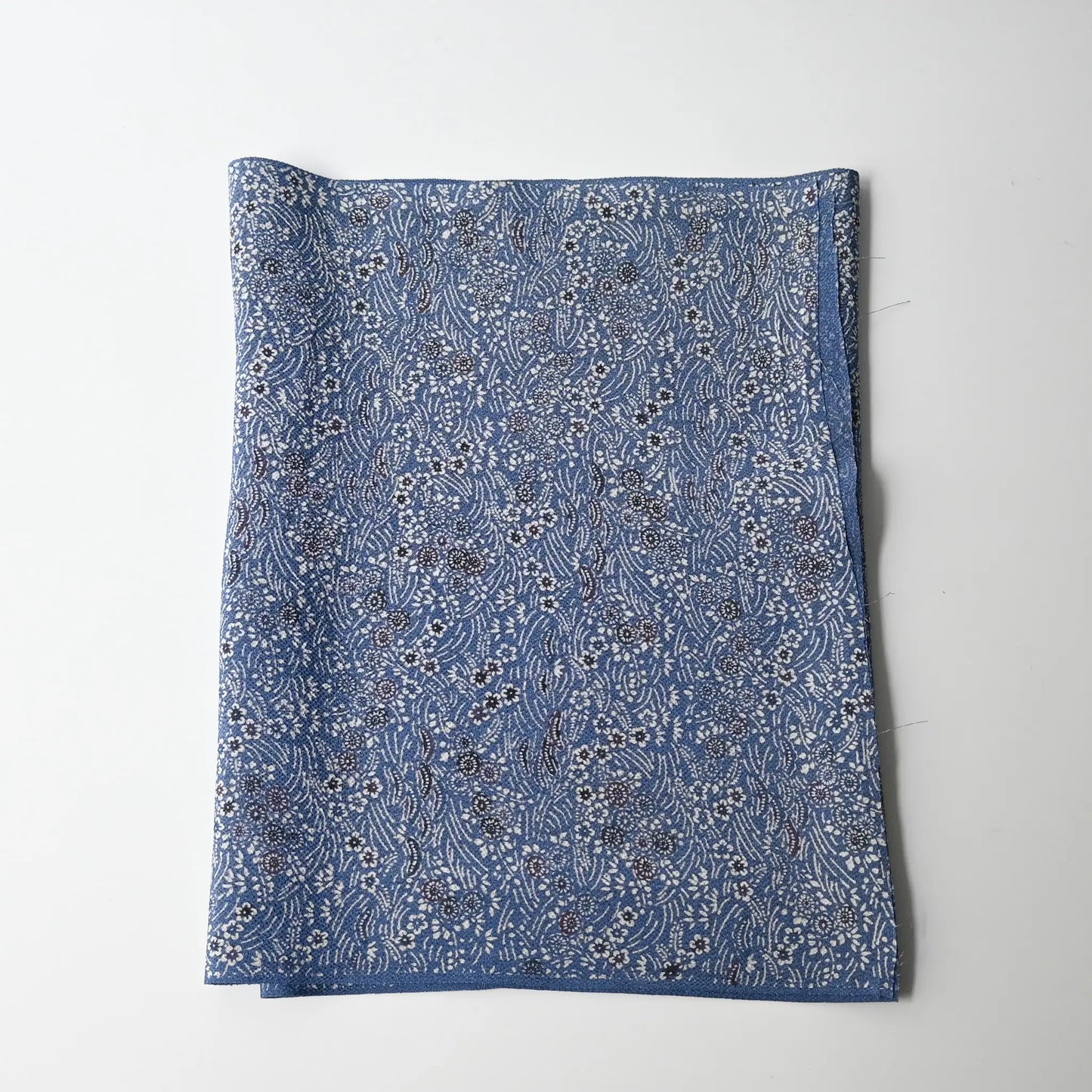 Vintage blue heavy silk crepe kimono fabric with katazome dyed small floral pattern.
