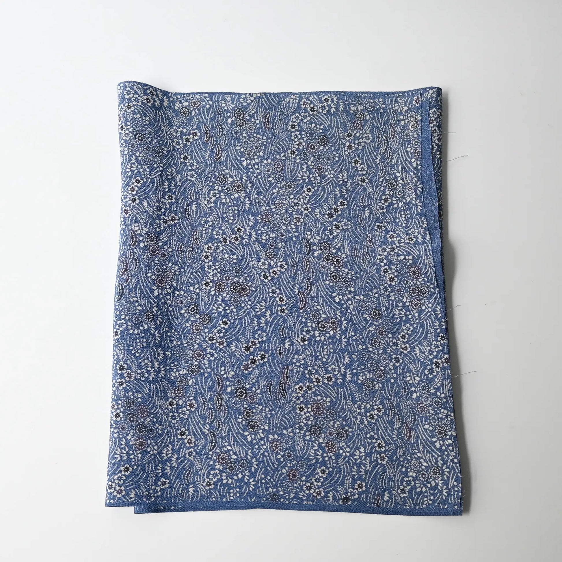 Vintage blue heavy silk crepe kimono fabric with katazome dyed small floral pattern.