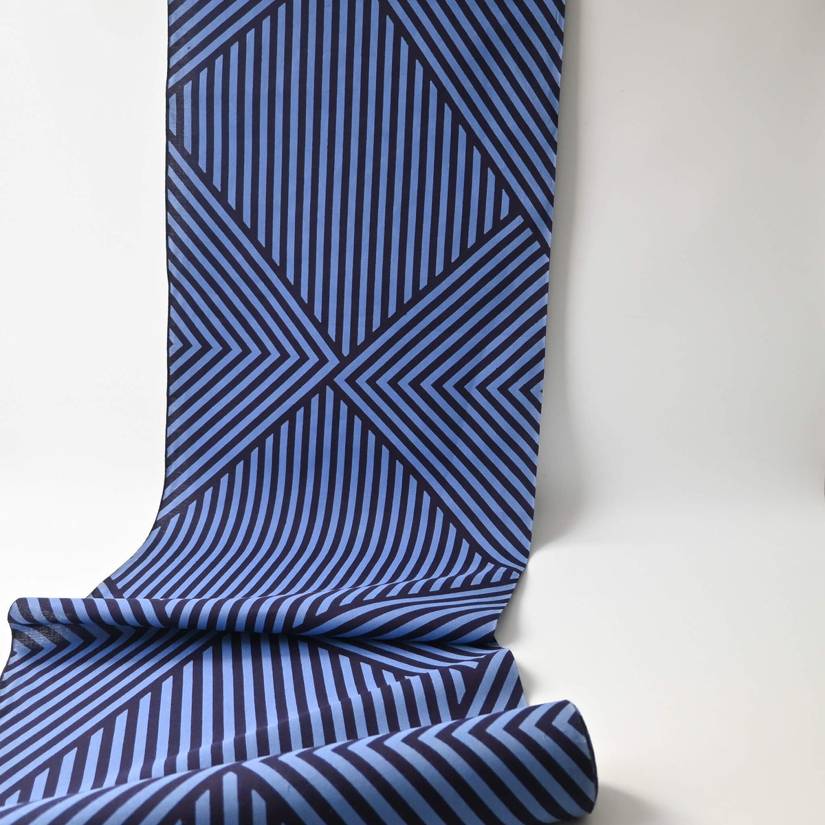 Vintage traditional Japanese men's yukata cotton fabric with bold geometric stripe pattern in bright blue and navy.