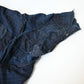 Detailed view of vintage Japanese Boro indigo cotton Noragi from the early to mid-20th century.