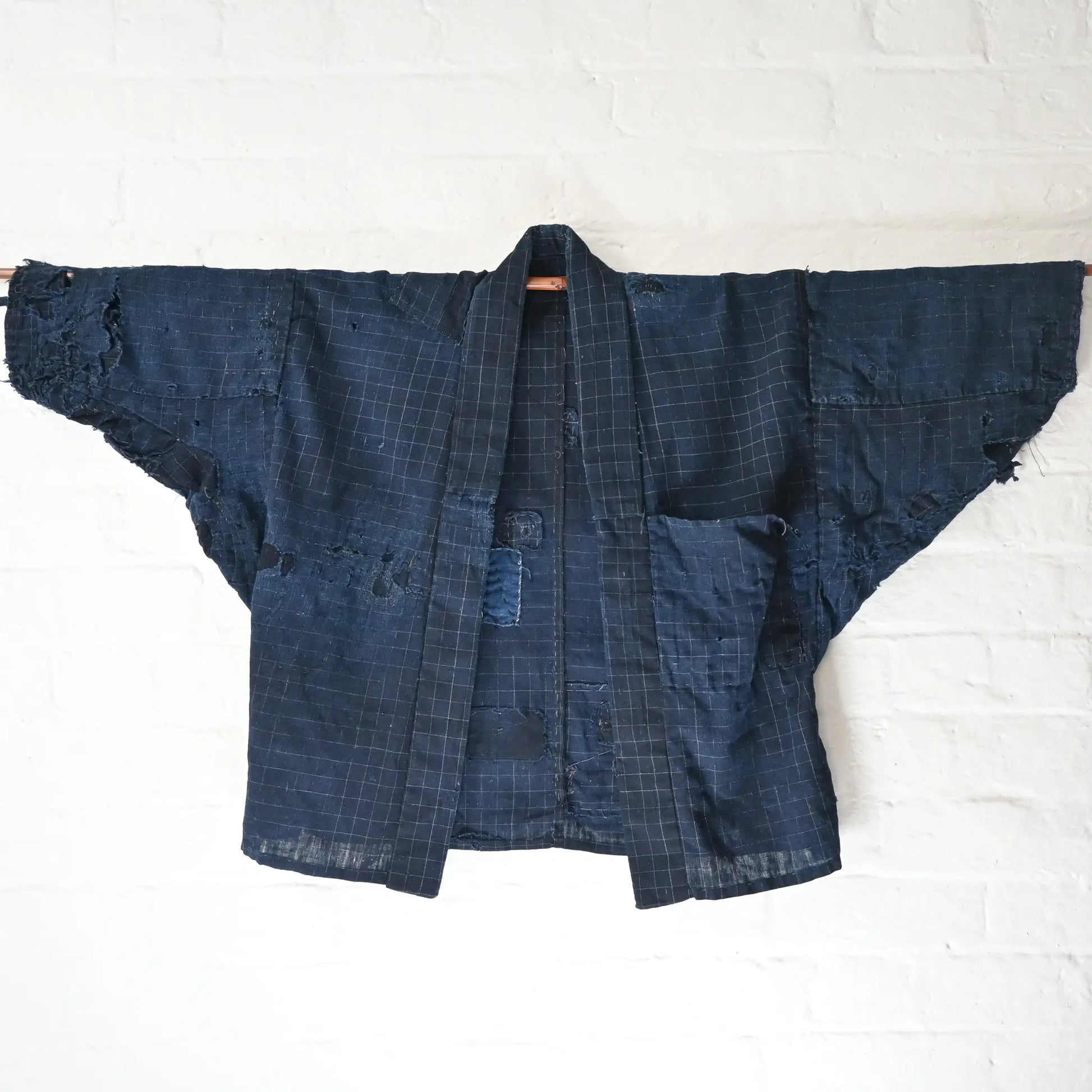 Full view of vintage Japanese Boro indigo cotton Noragi from the early to mid-20th century.