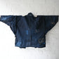 Detailed view of vintage Japanese Boro indigo cotton Noragi from the early to mid-20th century.