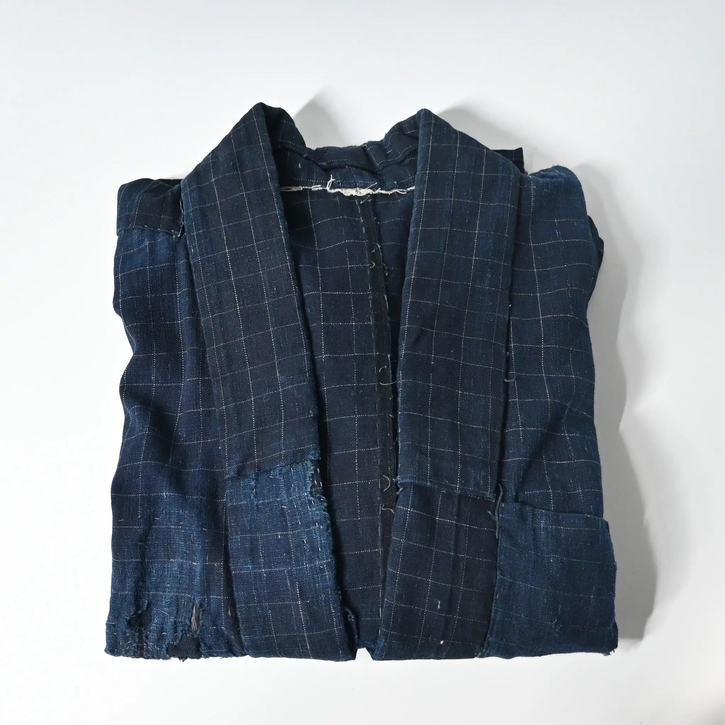 Vintage Japanese Boro indigo cotton Noragi from the early to mid-20th century.