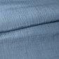 Detailed photo of vintage calm blue grey tone silk kimono fabric with distinctive texture, sold by the metre.