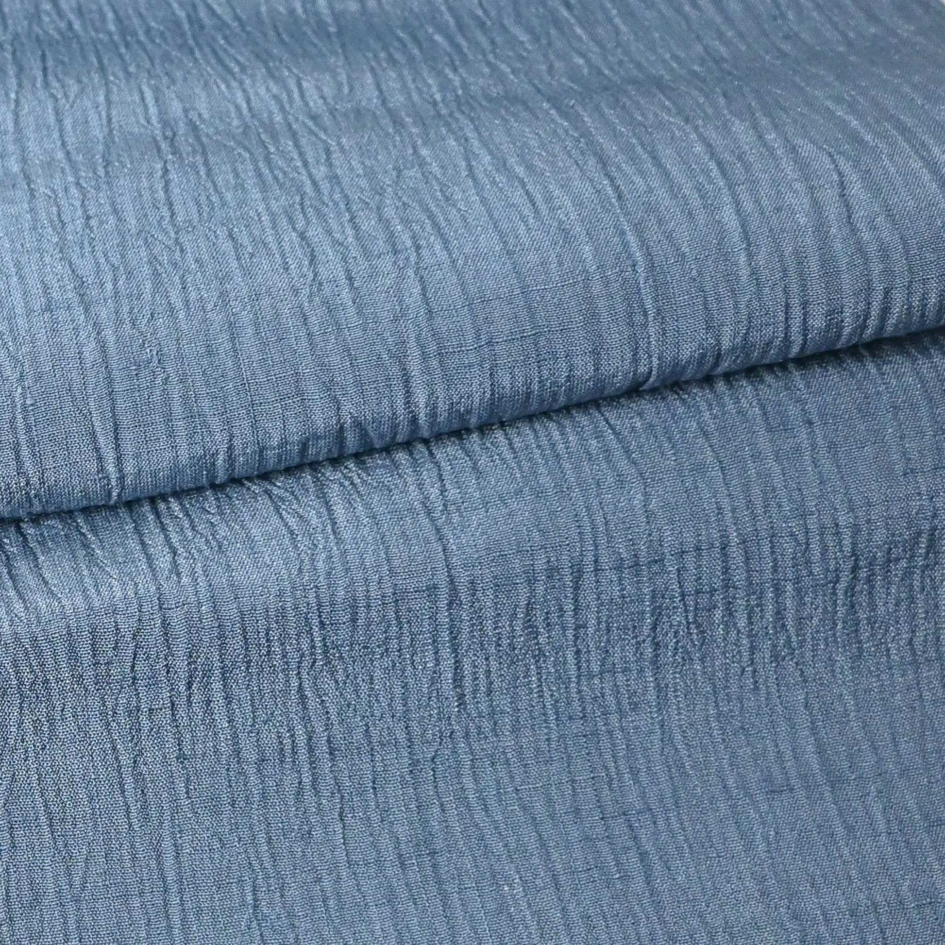 Detailed photo of vintage calm blue grey tone silk kimono fabric with distinctive texture, sold by the metre.